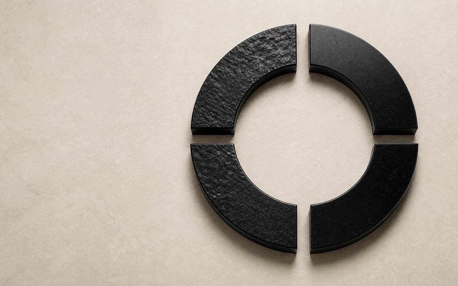 Four precision-cut obsidian arc segments forming an open cycle